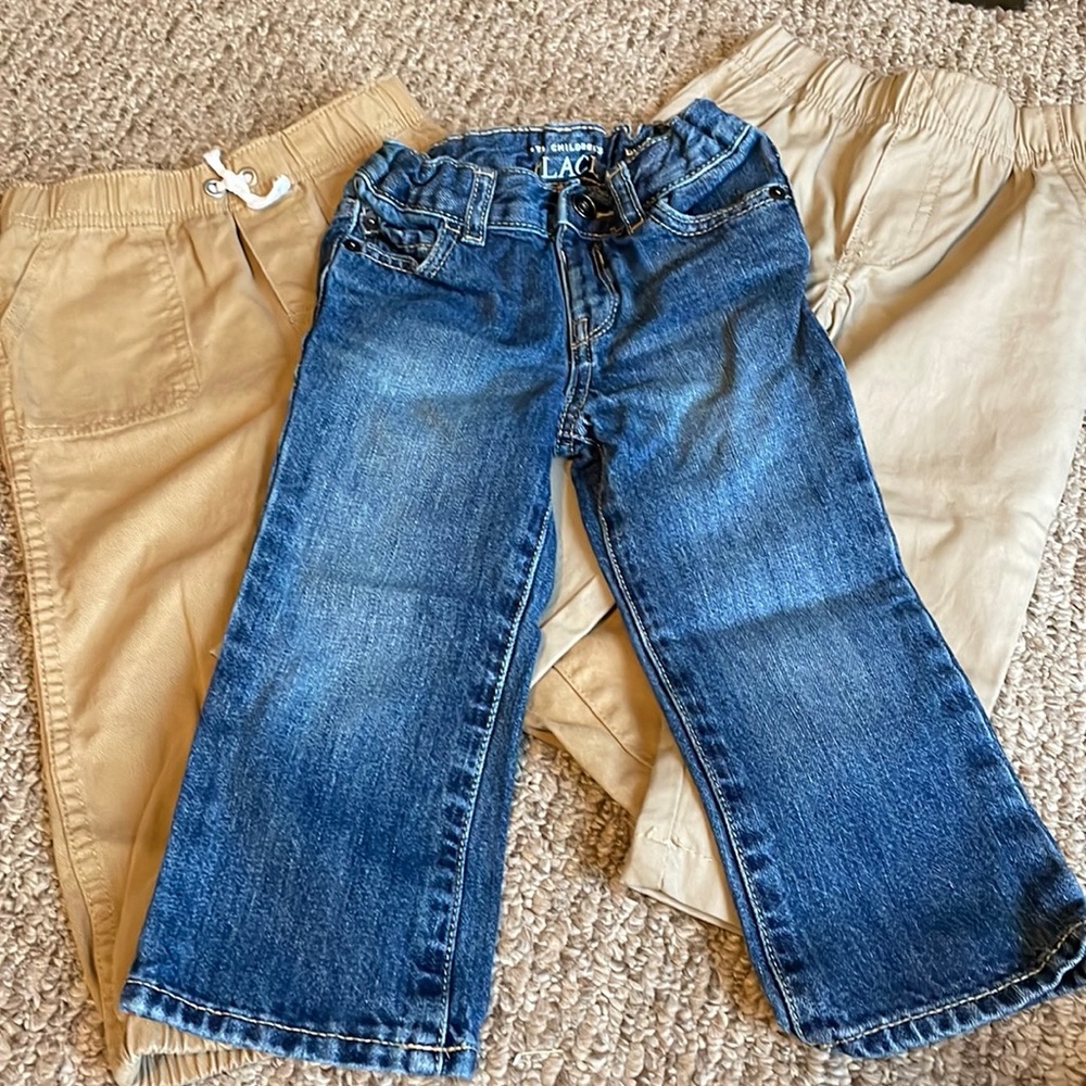 2 pairs of khaki pants and 2 pairs of jeans, 1 bootcut and 1 straight leg